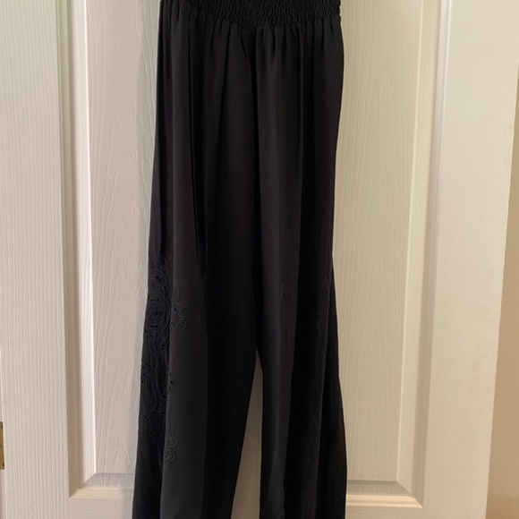 Black pants with pretty cutout detail on pant leg - Picture 2 of 3